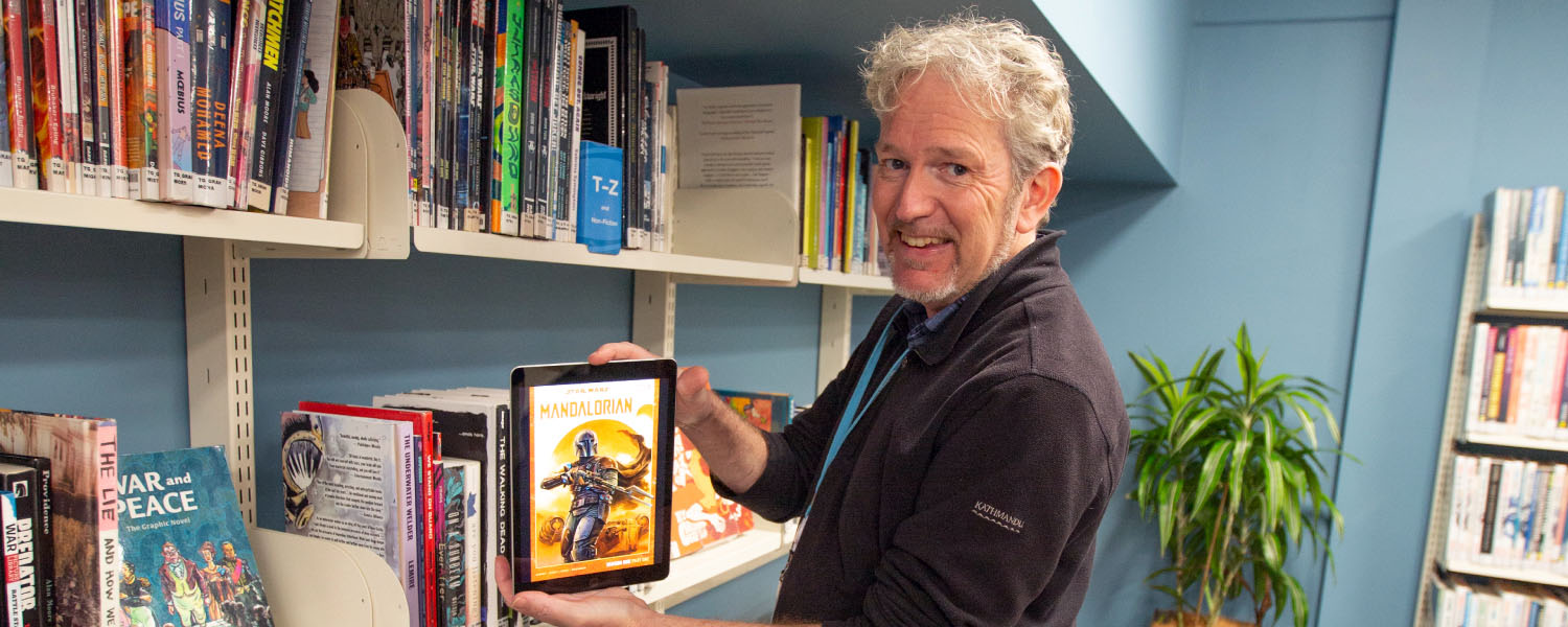 Accessing e-books and e-audiobooks through the library's digital collections.